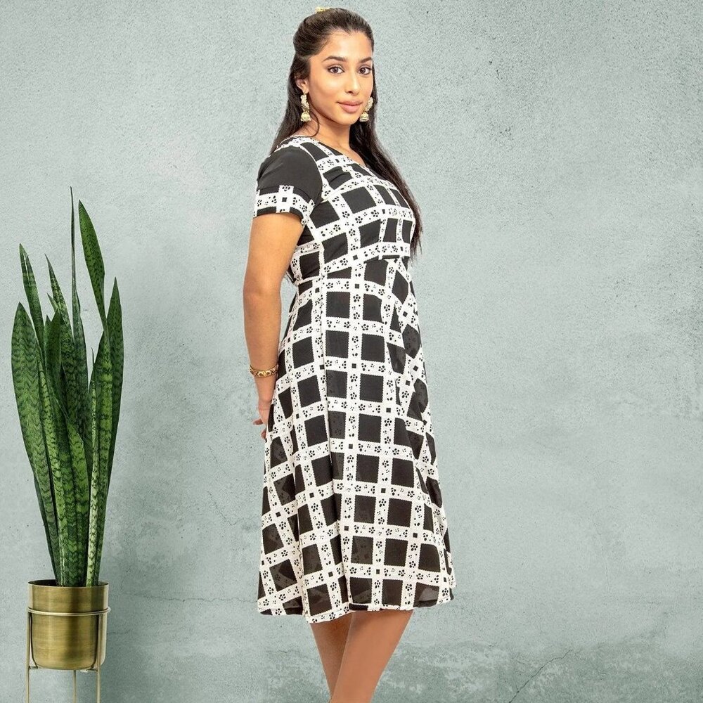 Chic Black and White Knee-Length Dress | Muvvas Boutique